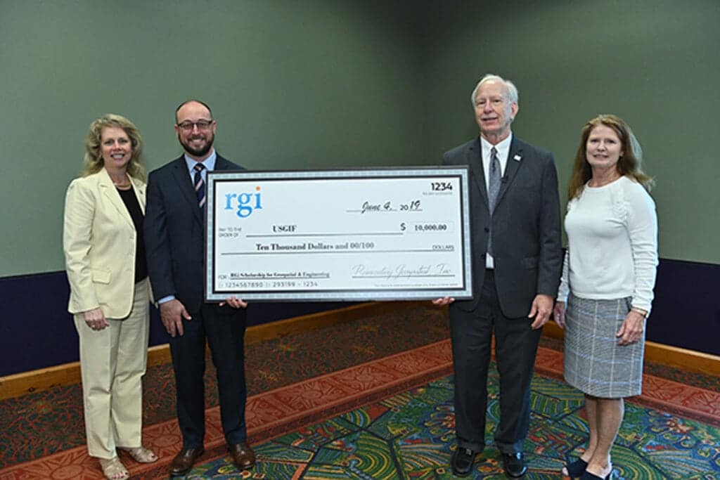 Picture of RGi Scholarship check donation